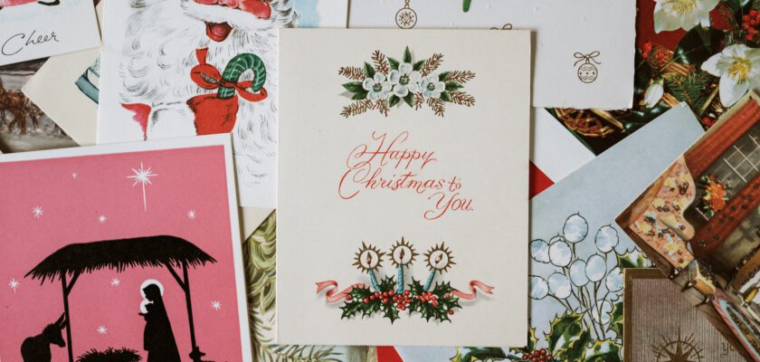 christmas cards on brown surface