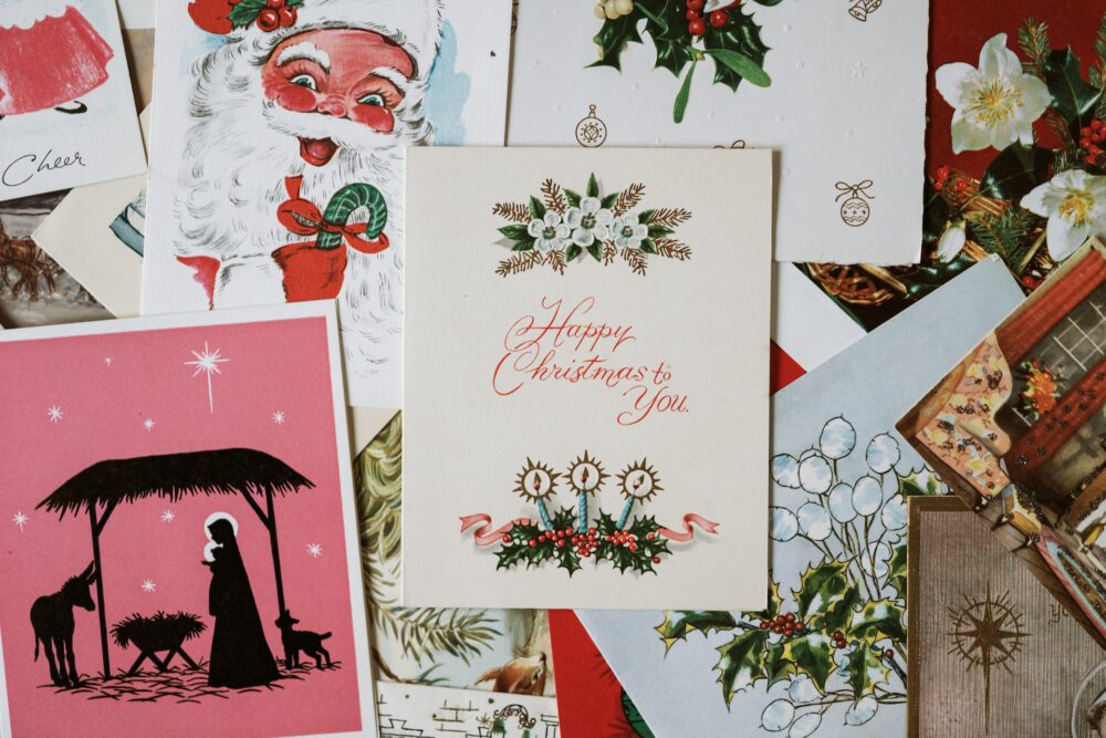 christmas cards on brown surface