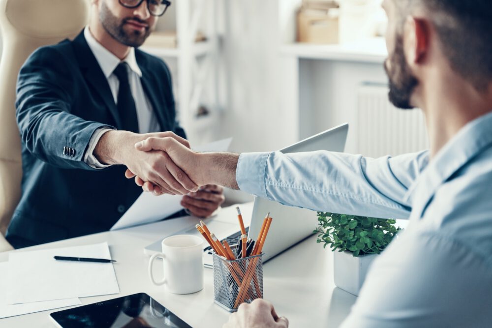 persons shaking hands